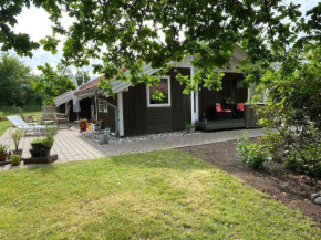 At Lovely Lyngsbæk Strand Near Ebeltoft, This Lovely Holiday Home Is At The End Of A Blind Path On A Beautiful, Large, Enclosed Plot, It Only Takes Approx, 5-6 Min, To Walk From The House Down To The 